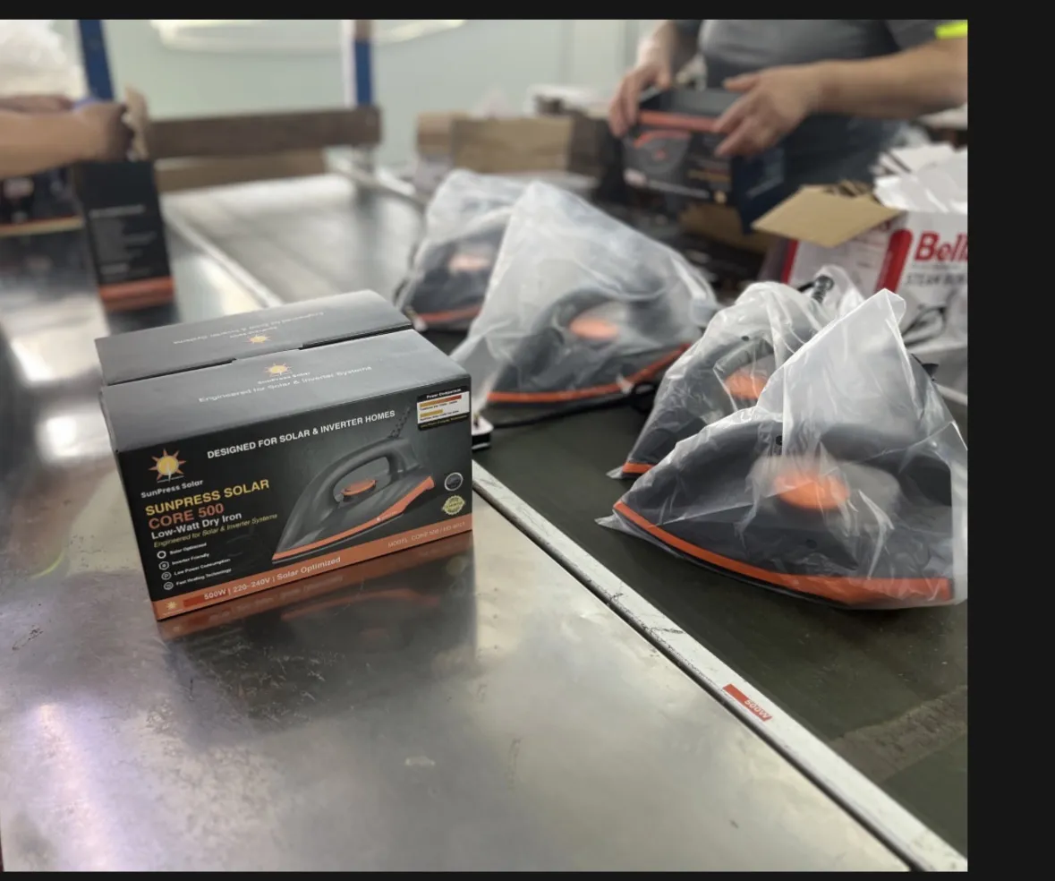 Freshly packed CORE 500 irons and retail boxes on the packing belt